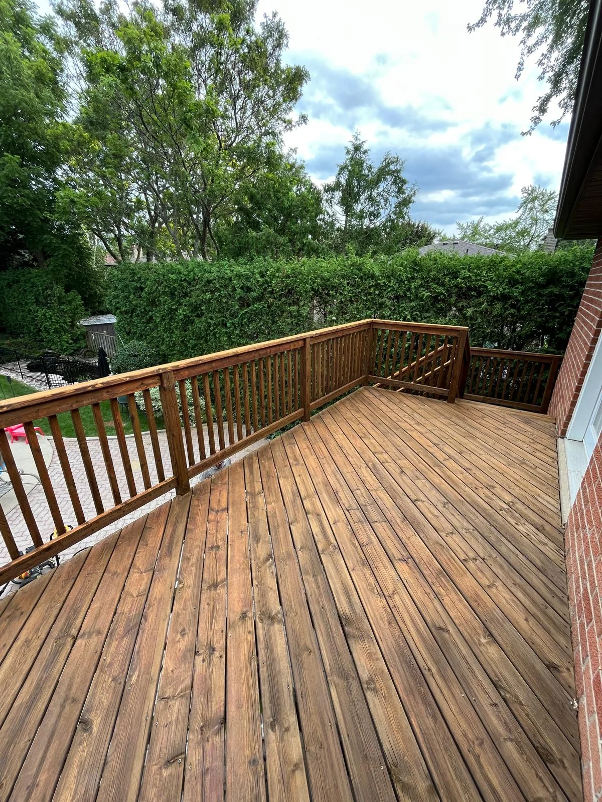 After deck cleaning and staining by Bright Home Care in the GTA