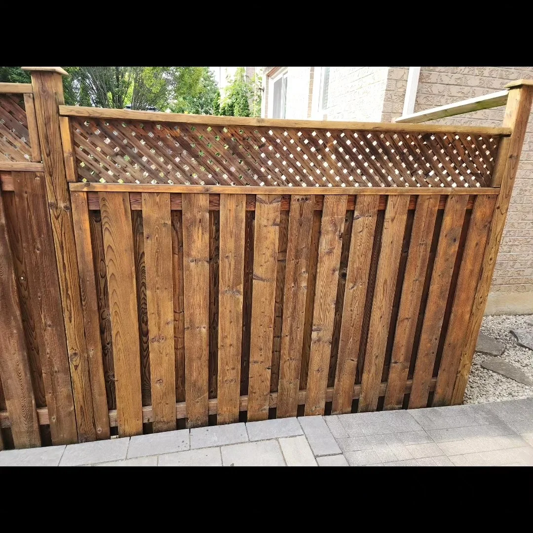 Before wood fence refinishing by Bright Home Care in the GTA