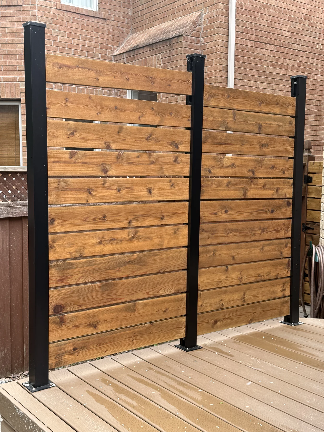 After horizontal fence staining by Bright Home Care in the GTA