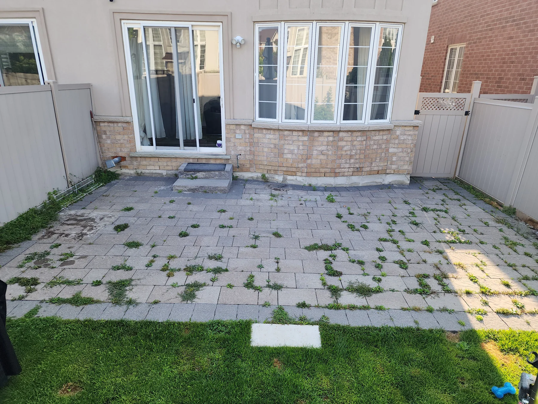 Before interlock power washing by Bright Home Care in the GTA