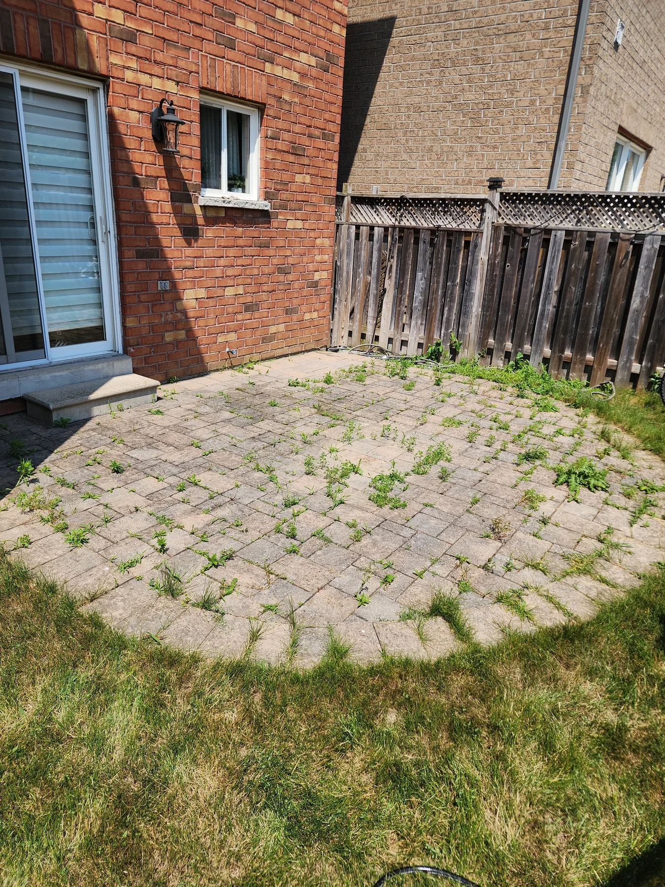 Before interlock patio cleaning by Bright Home Care in the GTA