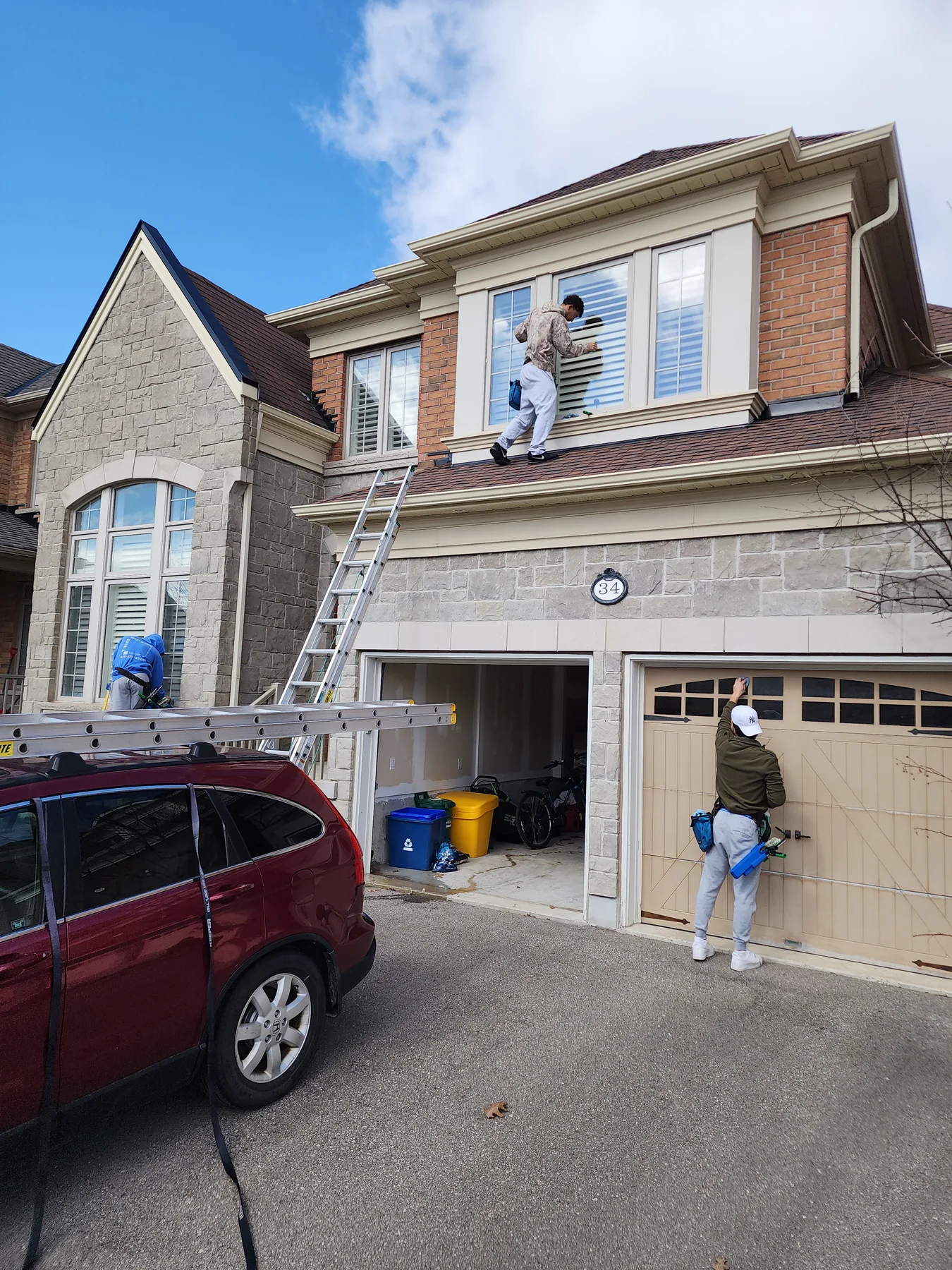 Exterior window cleaning ladder service by Bright Home Care in the GTA
